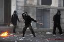 Protesters hurl rocks at police during rally in Athens
