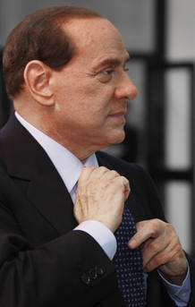 Italian Prime Minister Silvio Berlusconi arrives for the G8 summit in L'Aquila Italian Prime Minister Silvio Berlusconi arrives for the G8 summit in L'Aquila