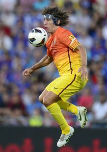 Puyol, en una acci&oacute;n del partido ante el Getafe.