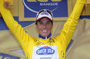 Quick Steps Sylvain Chavanel of France celebrates on the podium after the second stage of the Tour de France cycling race from Brussels to Spa
