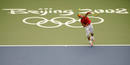Rafael Nadal of Spain serves to Potito Starace of Italy during their mens first round tennis match at the Beijing 2008 Olympic Games