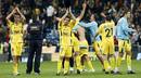Los jugadores del Alcorc&oacute;n celebran el pase a la siguiente ronda conseguida ante el Real Madrid tras perder por 1-0 en el Bernab&eacute;u.