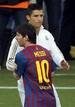 Barcelonas Lionel Messi greets Real Madrids Ronaldo before their Spanish first division 