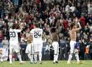 Los jugadores del Real Madrid, Gonzalo Higua&iacute;n, Javier Garc&iacute;a, Royston Ricky Drenthe y Sergio Ramos, de izda a dcha, al finalizar el partido que han disputado frente al Getafe.