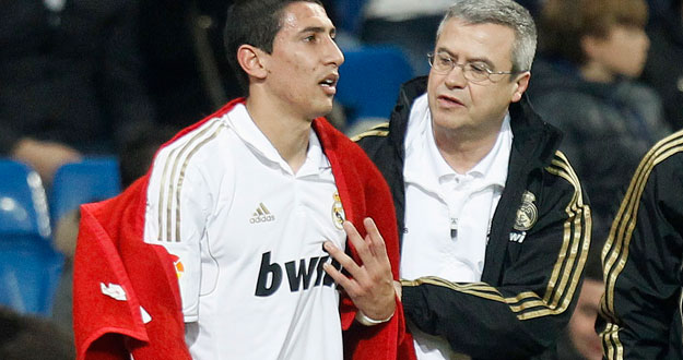 Real Madrid's Di Maria reacts after being injured during their Spanish First Division soccer match against Racing Santander in Madrid
