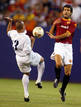 REAL MADRIDS ROBERTO CARLOS GOES FOR BALL AGAINST A.S. ROMAS JOSEP