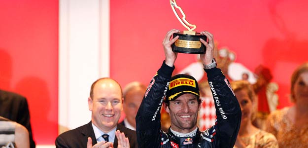 Red Bull Formula One driver Webber of Australia celebrates on the podium after winning the Monaco F1 Grand Prix