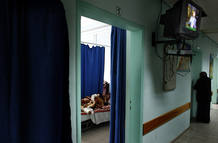 Sabbah Abu Halima lies in bed at hospital in Gaza