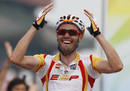 Samuel Sanchez of Spain crosses the finish line to win the mens road cycling competition at the Beijing 2008 Olympic Games