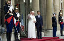 Frances President Sarkozy stands with Pope Benedict XVI at the Elysee Palace in Paris