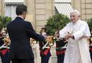 Frances President Sarkozy welcomes Pope Benedict XVI in the courtyard of the Elysee Palace in Paris
