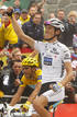 Saxo Banks Schleck of Luxembourg celebrates as he crosses the finish line to win ahead of Astanas Contador of Spain during the 17th stage of the Tour de France cycling race from Pau to Tourmalet Pass