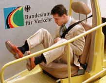 SCHUMACHER CHECKS A SAFETY BELT IN BONN. SCHUMACHER CHECKS A SAFETY BELT IN BONN.
