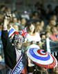 Un seguidor anima durante la jornada del torneo de taekwondo de los Juegos Ol&iacute;mpicos de Londres 2012.