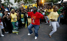 Supporters of ruling African National Congress President Jacob Zuma celebrate victory in South Africa's 2009 elections on the streets of Durban