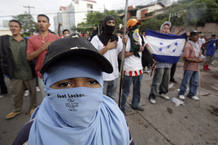 Supporters of Honduras' President Manuel Zelaya sing the national anthem outside the presidential house in Tegucigalpa Supporters of Honduras' President Manuel Zelaya sing the national anthem outside the presidential house in Tegucigalpa