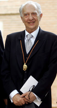 Mexican writer Pitol poses as he wears Premio Cervantes's medal after traditional ceremony at University of Alcala near Madrid