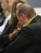 Simpsons sister Durio cries on the shoulder of Scotto as a verdict of guilty on all counts is read following Simpsons trial in Las Vegas