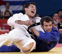 South Koreas Cho Jun-Ho fights with Spains Sugoi Uriarte in their mens -66kg bronze medal B judo match at London 2012 Olympic Games