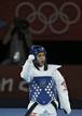 Brigitte Yag&uuml;e celebra un punto ante la mexicana Jannet Alegr&iacute;a en el combate de cuartos de final de la categor&iacute;a de -49 kilos at the London Olympic Games