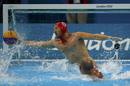 Spains Daniel Lopez Pinedo dives for the ball during their mens preliminary round Group A water polo match against Kazakhstan at the Water Polo Arena during the London 2012 Olympic Games