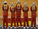 Feliciano Lopez , David Ferrer , Fernando Verdasco , Rafael Nadal y el capit&aacute;n Albert Costa posan con su trofeos.