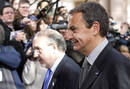 Spains Finance Minister Solbes and Prime Minister Zapatero arrive on the last day of a two-day EU leaders summit in Brussels