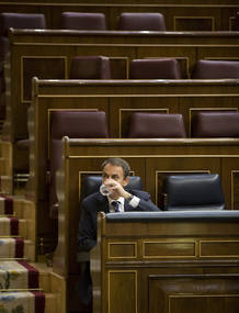 Spain's Prime Minister Jose Luis Rodriguez Zapatero drinks in parliament in Madrid