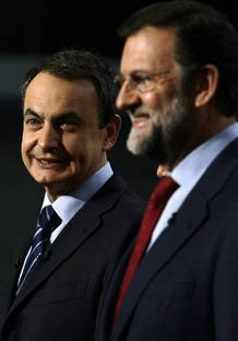 Spain's Prime Minister Zapatero and opposition Popular Party leader Rajoy pose before televised debate in Madrid Spain's Prime Minister Zapatero and opposition Popular Party leader Rajoy pose before televised debate in Madrid