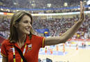 Spains Princess Letizia waves to the crowd as she and her husband Crown Prince Felipe arrive to watch the womens Group B basketball game between Spain and China at the Beijing 2008 Olympic Games