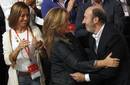 Spains Socialist prime ministerial candidate Rubalcaba embraces Foreign Minister Jimenez in front of Defense Minister Chacon during the PSOE political conference in Madrid