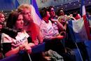 Supporters of Nicolas Sarkozy, Frances President and UMP party candidate for his re-election, wait for results in the second round vote of the 2012 French presidential elections at the Mutualite meeting hall in Paris