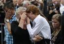 Survivors of a shooting rampage on the Utoeya island break out in tears following a memorial service in the Oslo cathedral