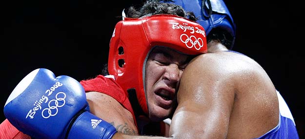 Pitt of Australia fights Arjaoui of Morocco during their men's heavyweight (91kg) round of 16 boxing match at the Beijing 2008 Olympic Games Pitt of Australia fights Arjaoui of Morocco during their men's heavyweight (91kg) round of 16 boxing match at the Beijing 2008 Olympic Games