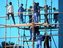 Trabajadores en andamios