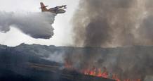 Unos 400 personas trabajan en la extinción del fuego que arrasa 500 hectáreas en Ávila Unos 400 personas trabajan en la extinción del fuego que arrasa 500 hectáreas en Ávila