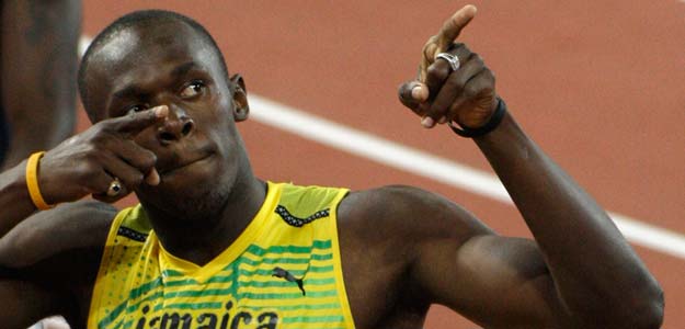 Usain Bolt gana el oro de los 100 metros y de los 200 Usain Bolt gana el oro de los 100 metros y de los 200