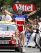 Voeckler of France celebrates as he crosses finish line to win 15th stage of Tour de France cycling race between Pamiers and Bagneres-de-Luchon