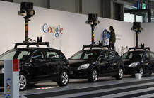 A worker makes final touches at the stand of Google where cars used for "Google View" are on display at the CeBIT exhibition centre in Hanover A worker makes final touches at the stand of Google where cars used for "Google View" are on display at the CeBIT exhibition centre in Hanover