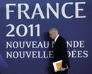 Yorgos Papandreou en su llegada a la reuni&oacute;n con Merkel y Sarkozy