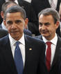 U.S. President Obama and Spains PM Jose Luis Rodriguez Zapatero leave a group photo session at the E.U. Summit in Prague