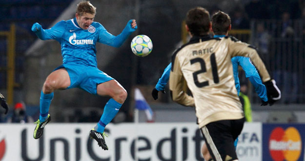 Zenit St. Petersburg's Hubocan jumps to head the ball during their Champions League last 16 first leg soccer match against Benfica at the Petrovsky stadium in St. Petersburg